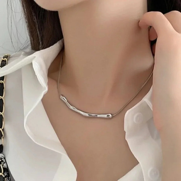 Sterling Silver Necklace: Sleek Silver Necklace with an Abstract Wavy Pendant - Picture 2 of 3